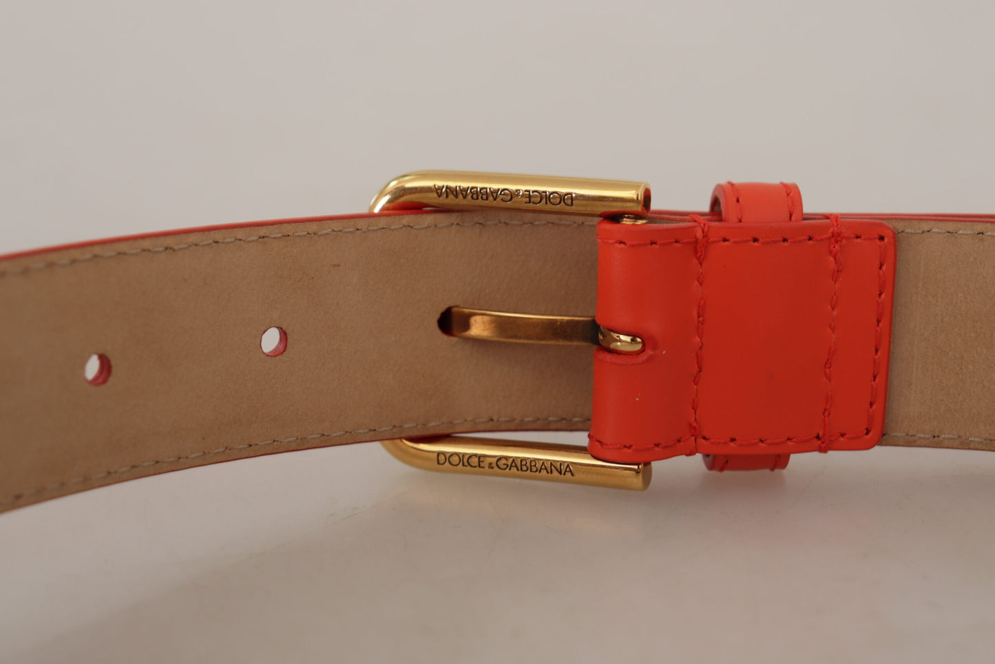 Cinturón elegante de cuero naranja con estuche para auriculares