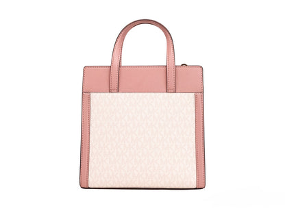 Bolso bandolera pequeño Cece de PVC rosa con solapa Norte-Sur