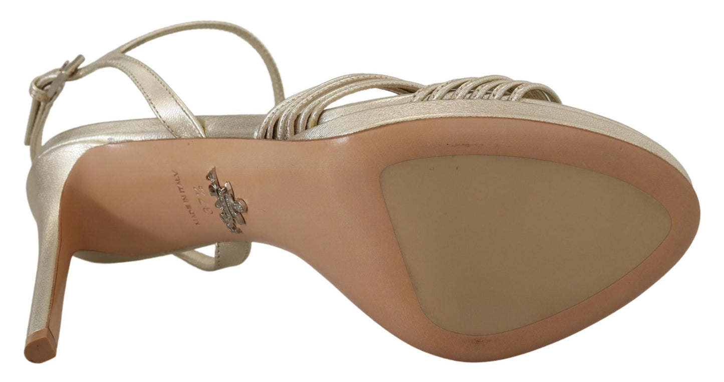 Elegantes sandalias de tacón de aguja doradas