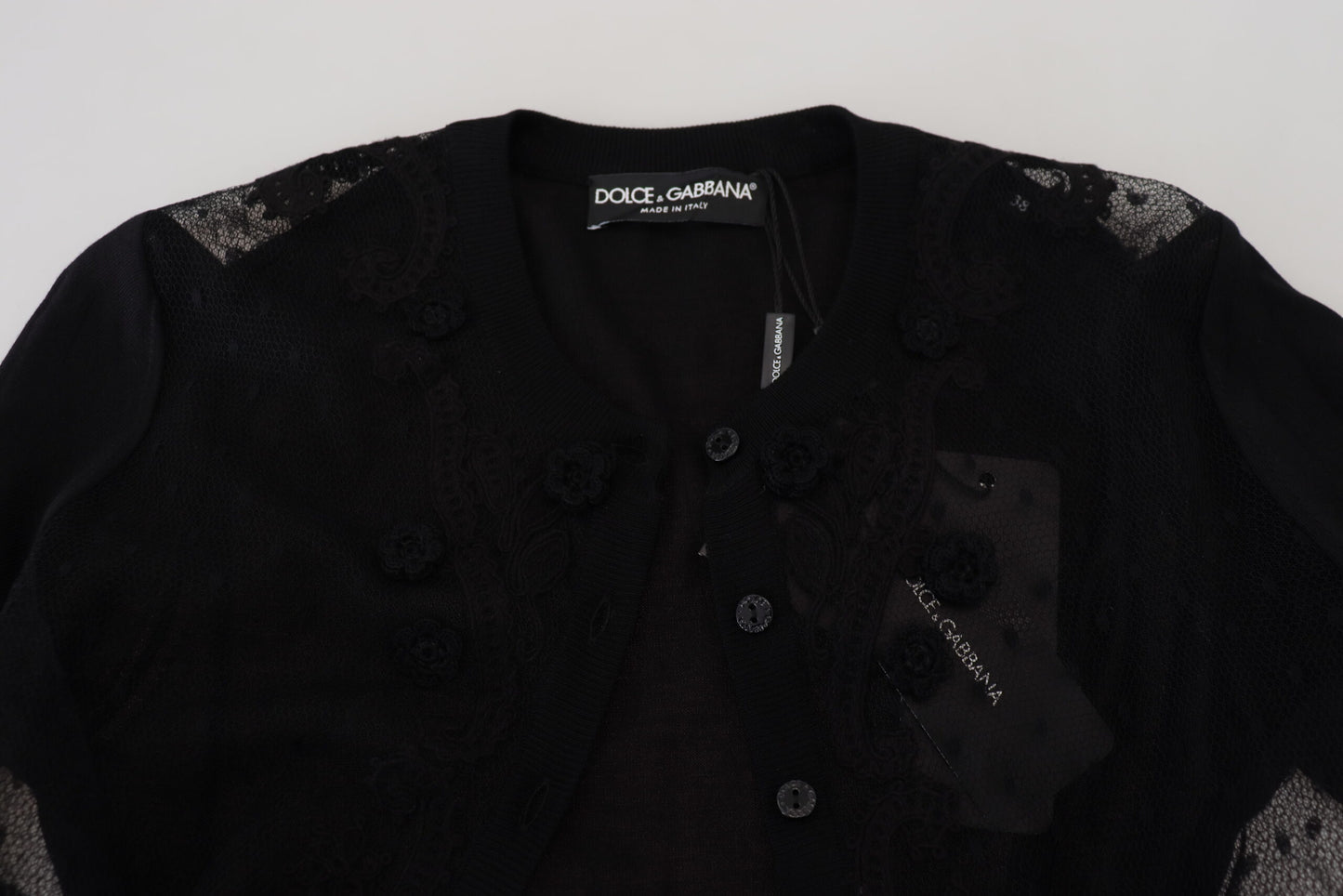 Elegante suéter tipo cárdigan de encaje floral negro