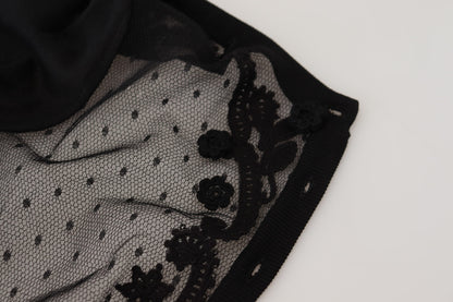 Elegante suéter tipo cárdigan de encaje floral negro