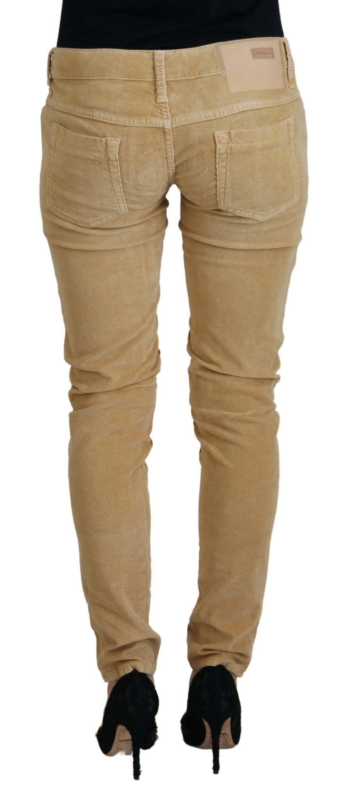 Pantalones de pana ajustados de cintura baja y color marrón elegante