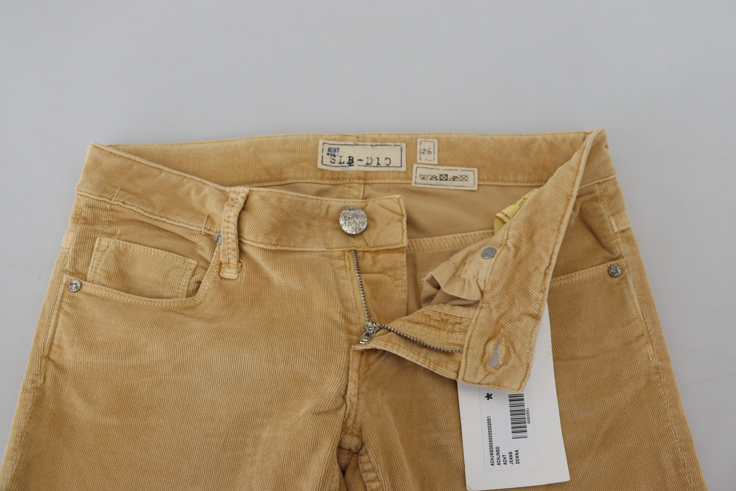 Pantalones de pana ajustados de cintura baja y color marrón elegante