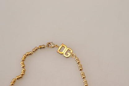 Elegante collar de cadena con dijes dorados