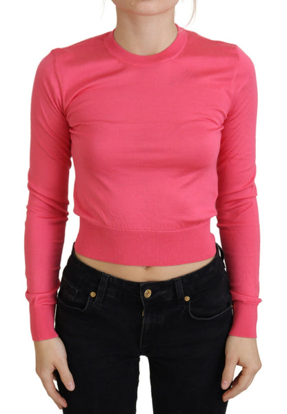 Elegante suéter rosa corto de cuello redondo