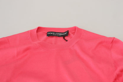 Elegante suéter rosa corto de cuello redondo
