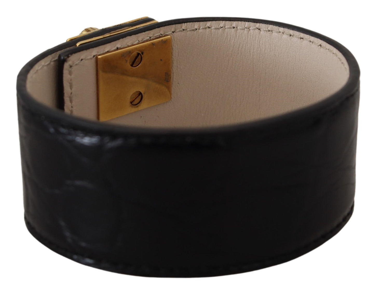 Elegante pulsera de cuero negro con detalles dorados