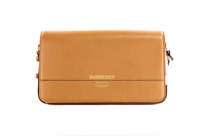 Bolso de mano Grace pequeño color nuez moscada de piel lisa con solapa y bandolera