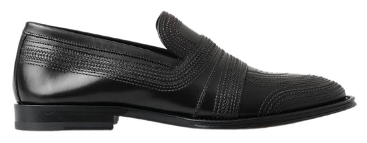 Elegantes mocasines de piel negra