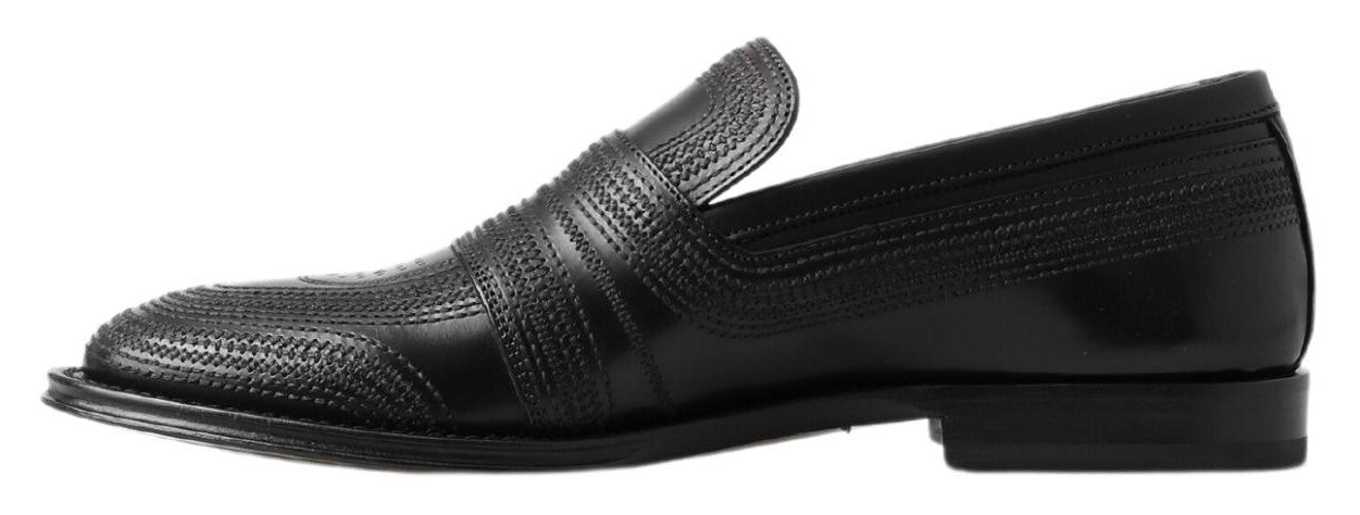 Elegantes mocasines de piel negra