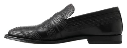 Elegantes mocasines de piel negra