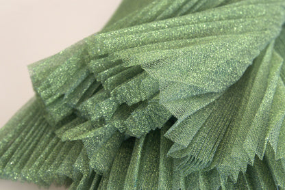 Encantadora falda plisada de corte A en color verde metalizado