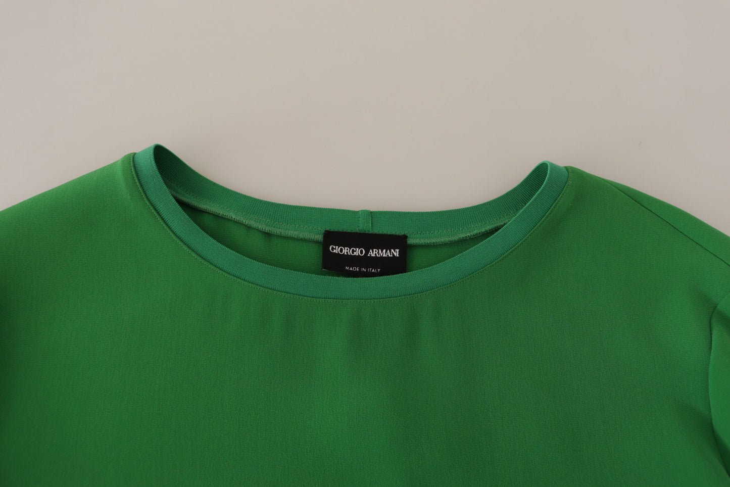 Elegante suéter de seda de manga larga en verde intenso