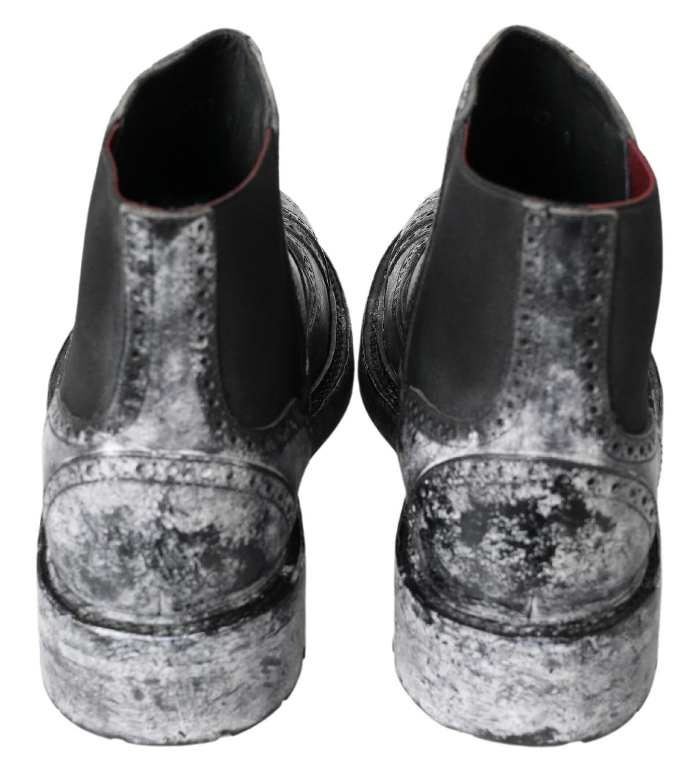 Elegantes botines Chelsea negros descoloridos
