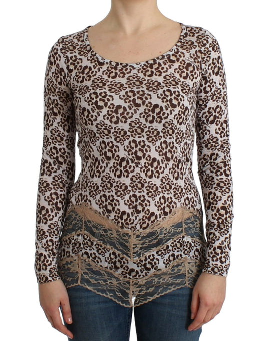 Elegante blusa de manga larga con encaje floral