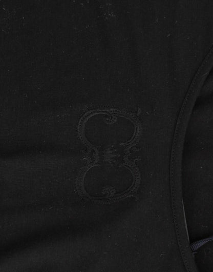 Elegante top negro con mangas cortas