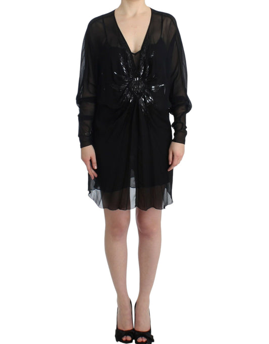 Elegante vestido blusón de seda negra transparente