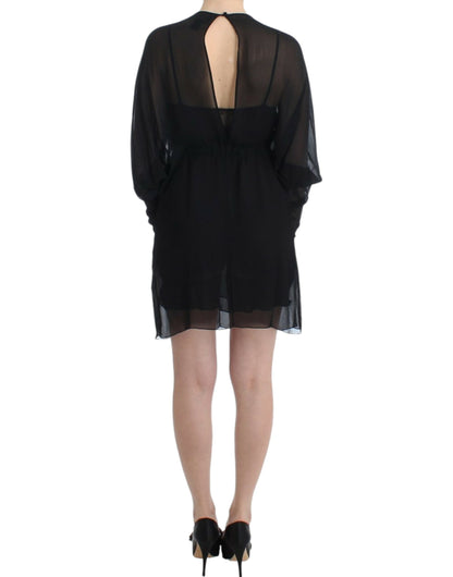 Elegante vestido blusón de seda negra transparente