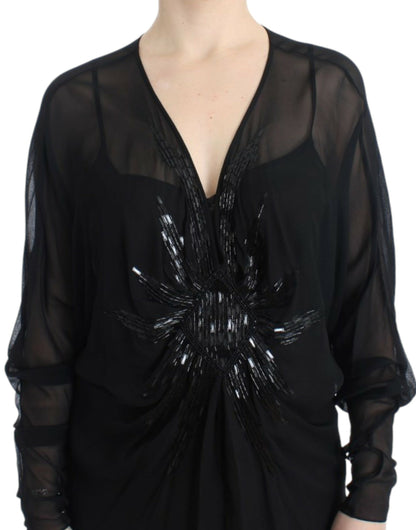 Elegante vestido blusón de seda negra transparente