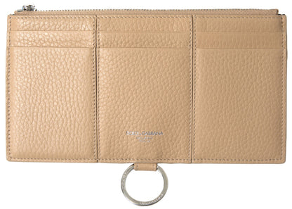 Elegante cartera de piel beige con correa desmontable