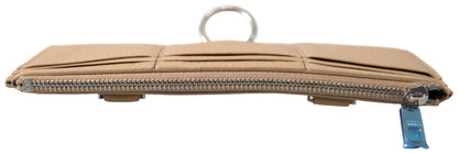 Elegante cartera de piel beige con correa desmontable