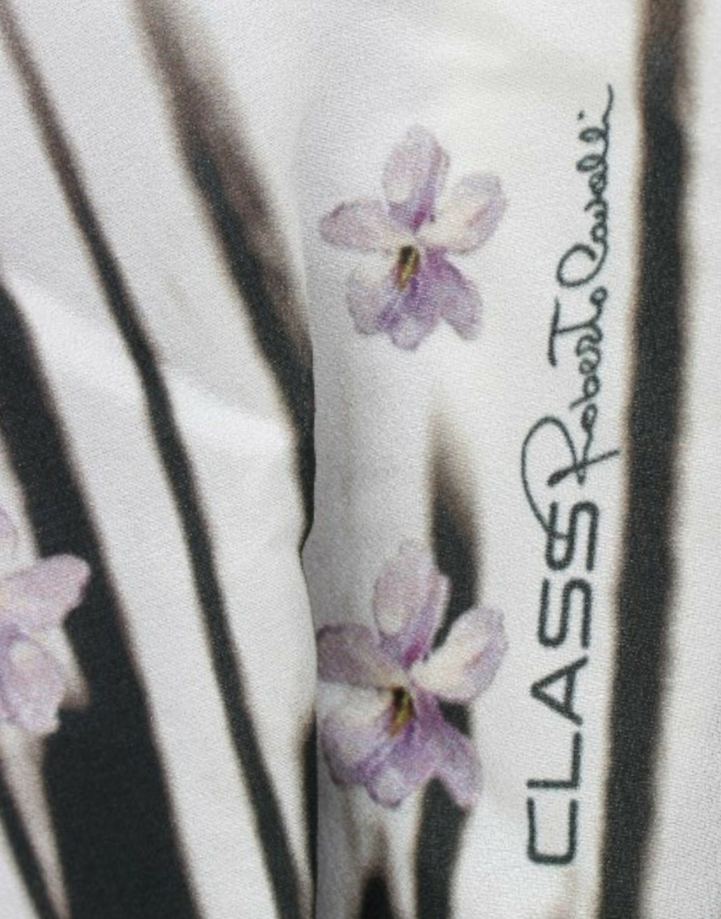 Elegante vestido de jersey con estampado floral morado