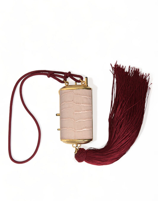 Mini bolso de espejo de cuero rosa exótico con borla