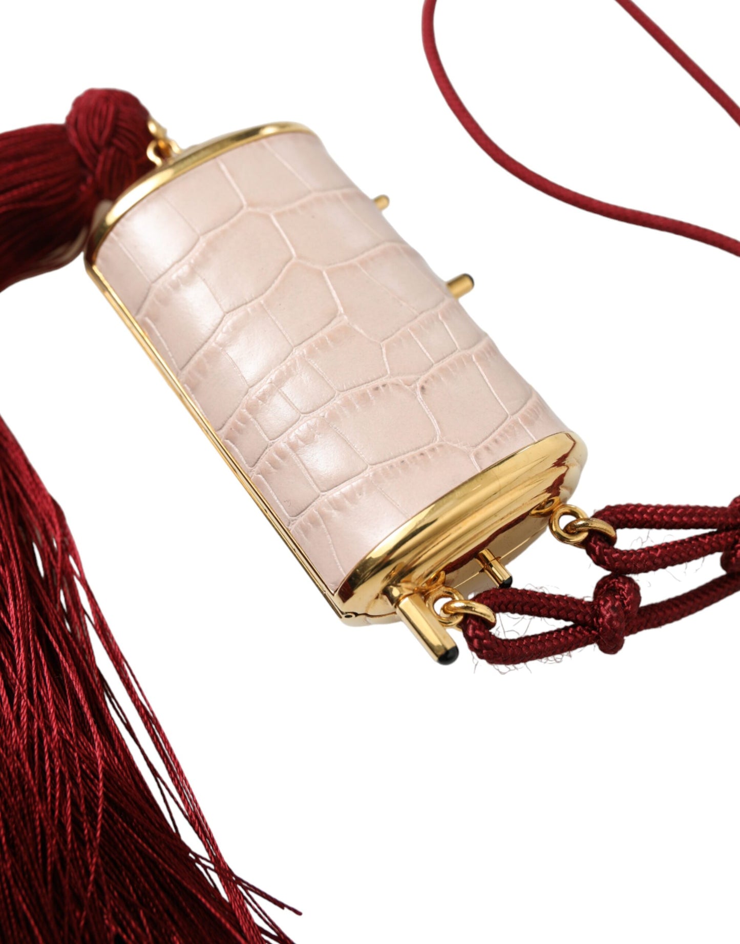 Mini bolso de espejo de cuero rosa exótico con borla