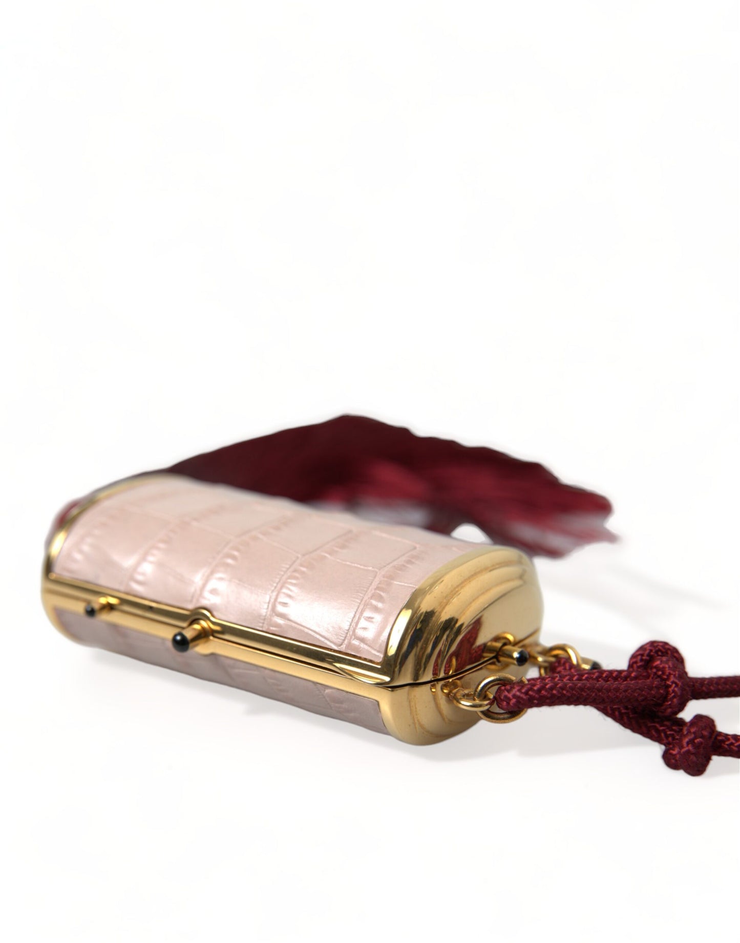 Mini bolso de espejo de cuero rosa exótico con borla