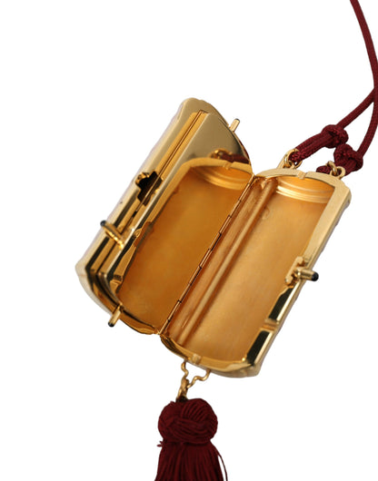 Mini bolso de espejo de cuero rosa exótico con borla