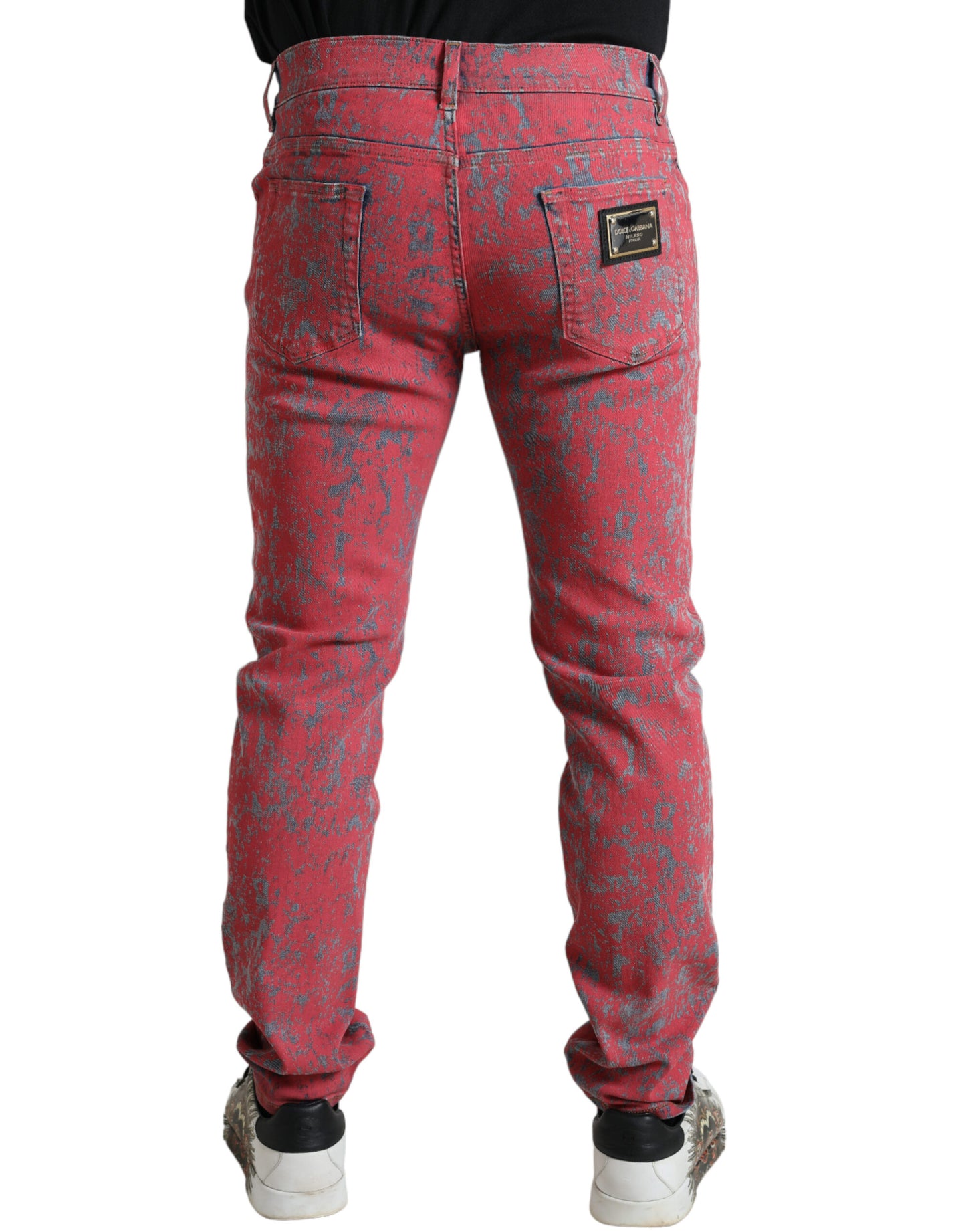 Vaqueros ajustados con efecto tie-dye rojo