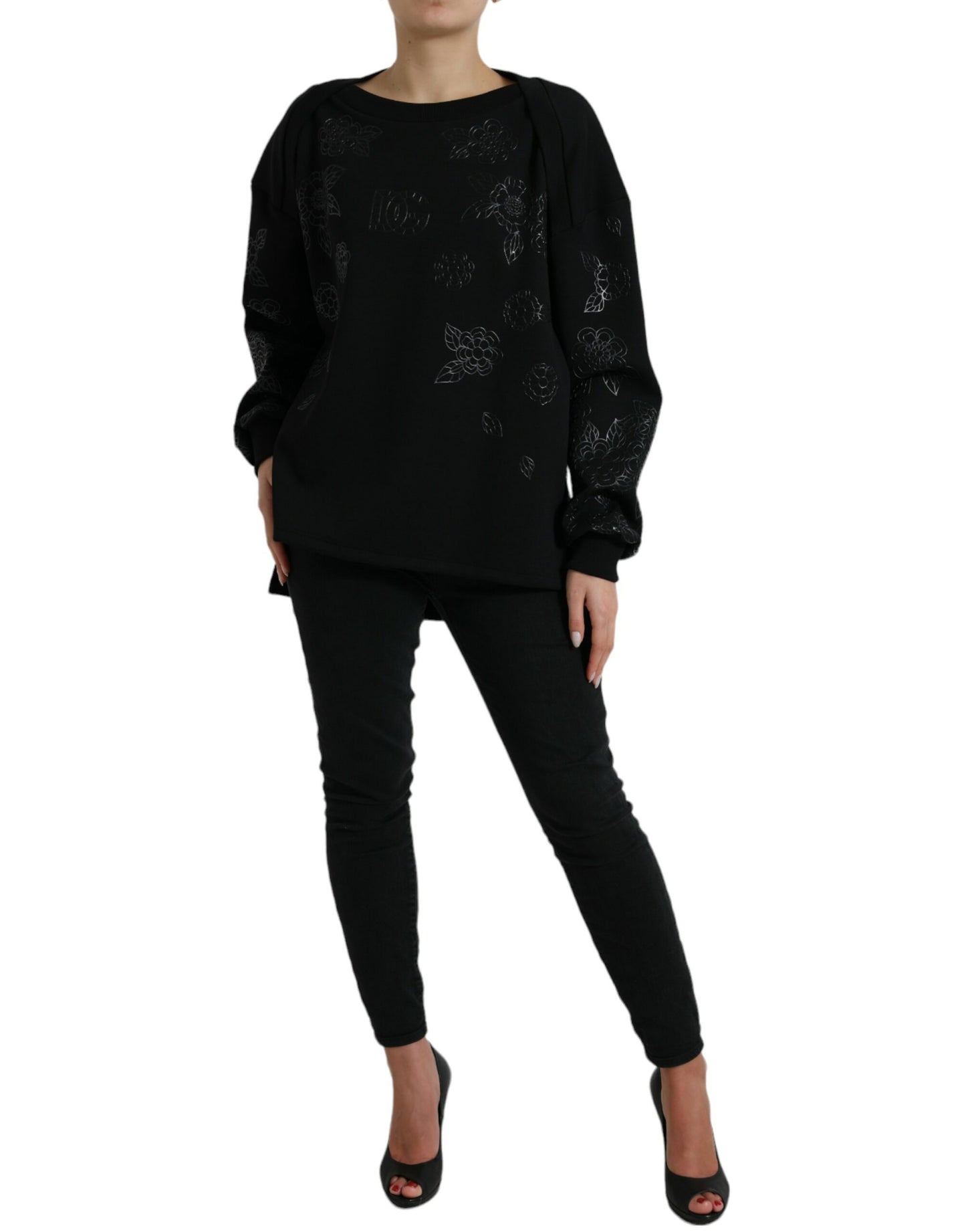 Elegante suéter negro con apliques florales