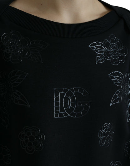 Elegante suéter negro con apliques florales