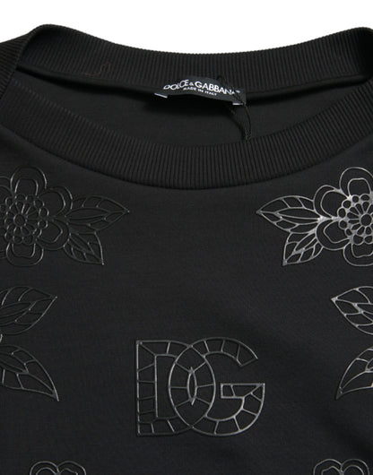 Elegante suéter negro con apliques florales