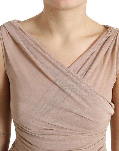 Elegante top sin mangas con escote en V en color beige transparente