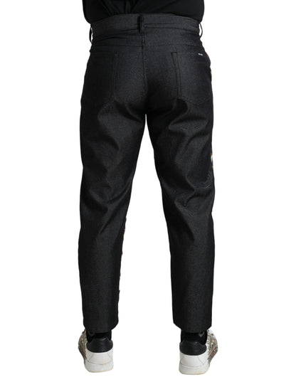 Elegantes pantalones ajustados de seda con estampado heráldico