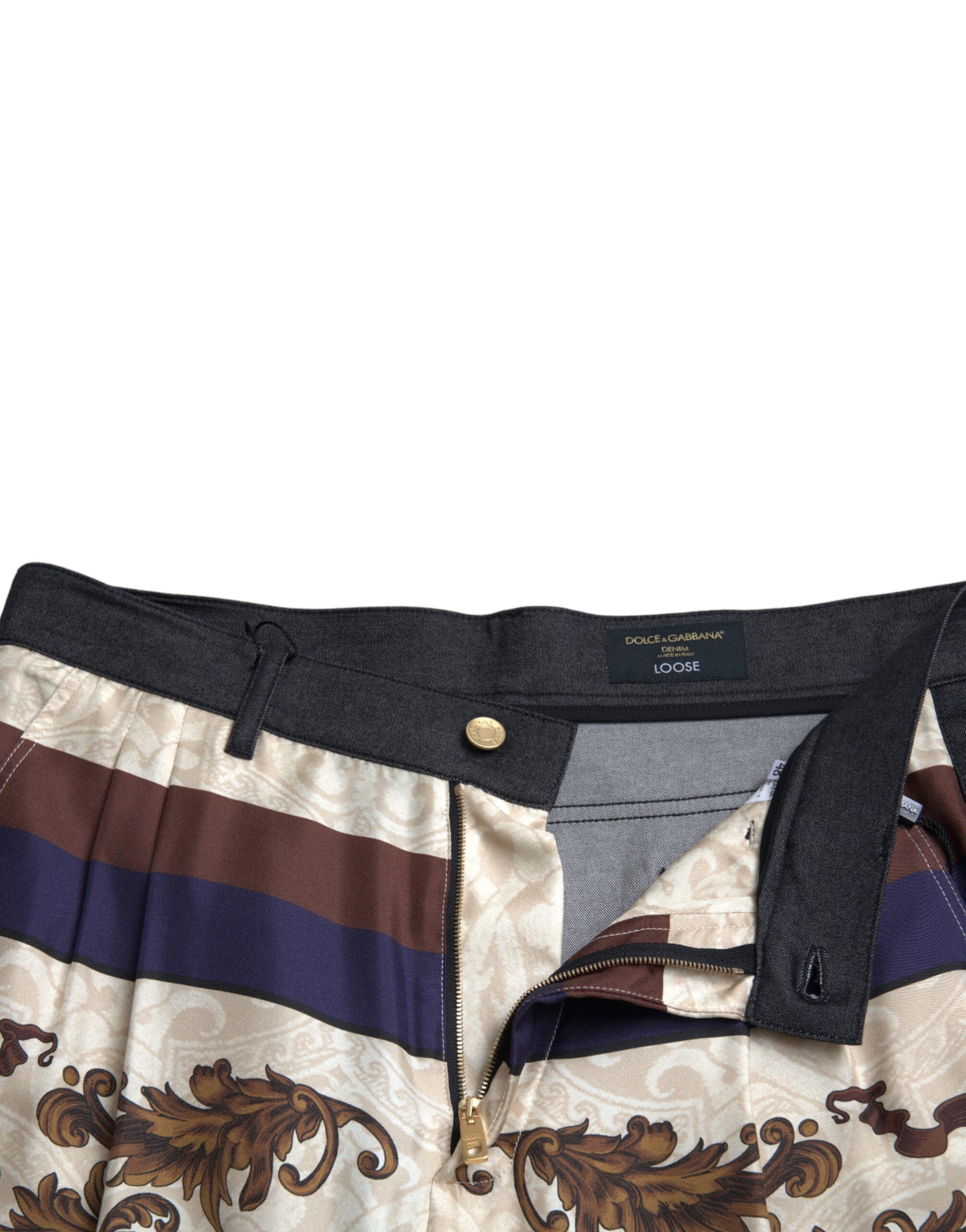 Elegantes pantalones ajustados de seda con estampado heráldico