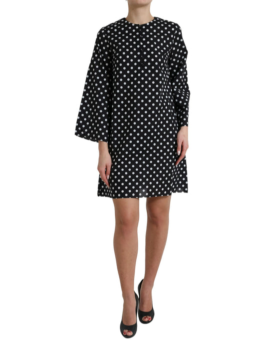 Elegante minivestido recto de lunares