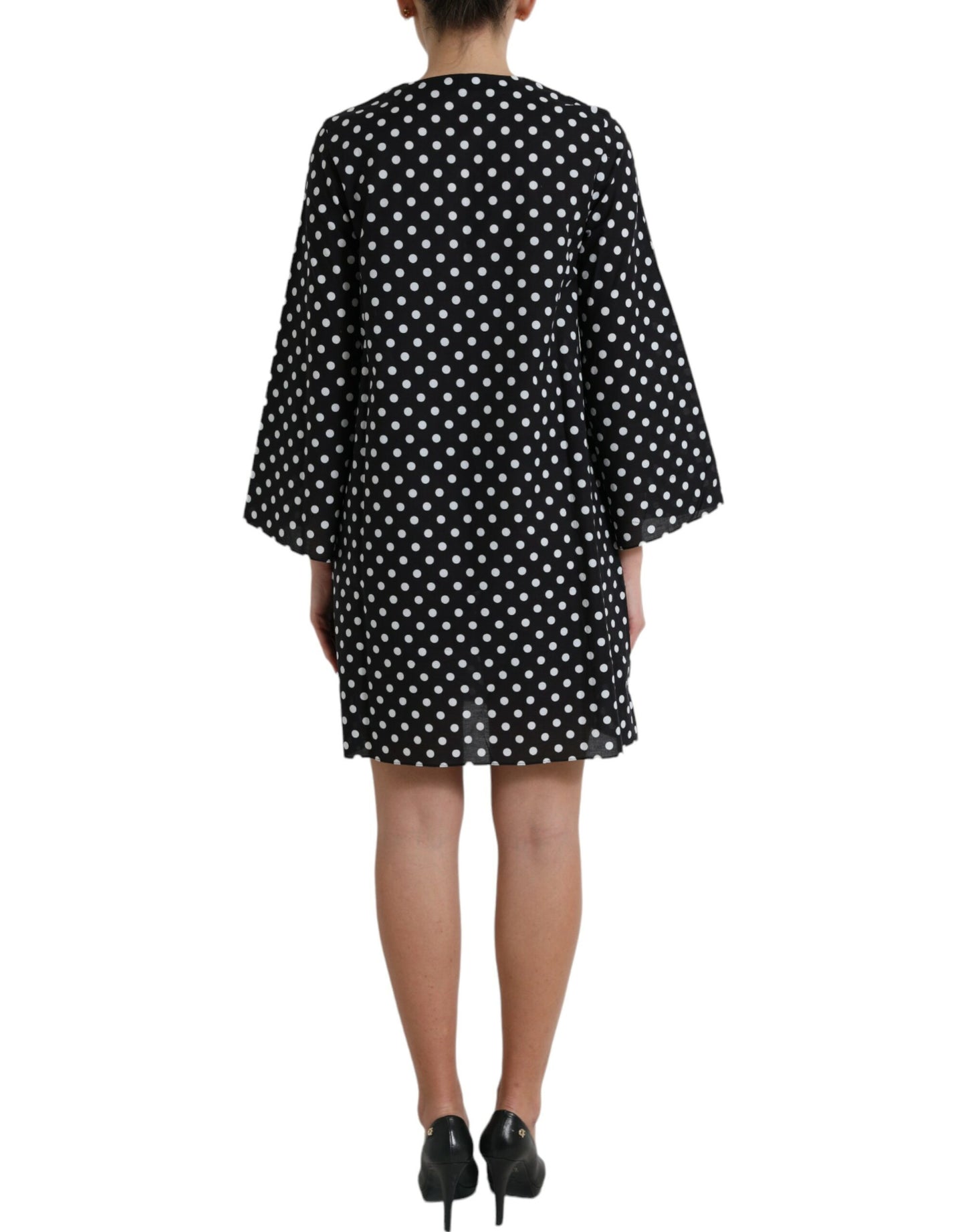 Elegante minivestido recto de lunares