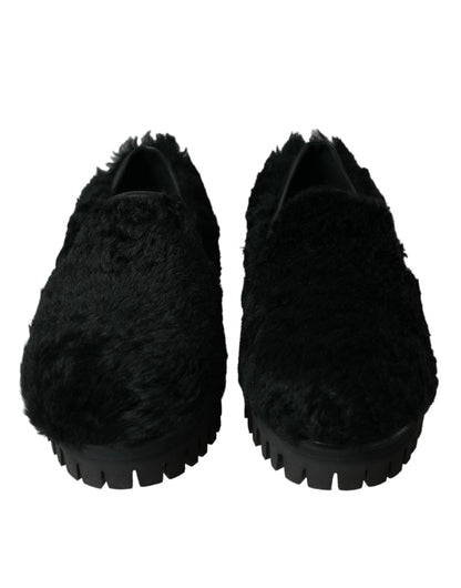 Elegantes mocasines negros de piel para hombre
