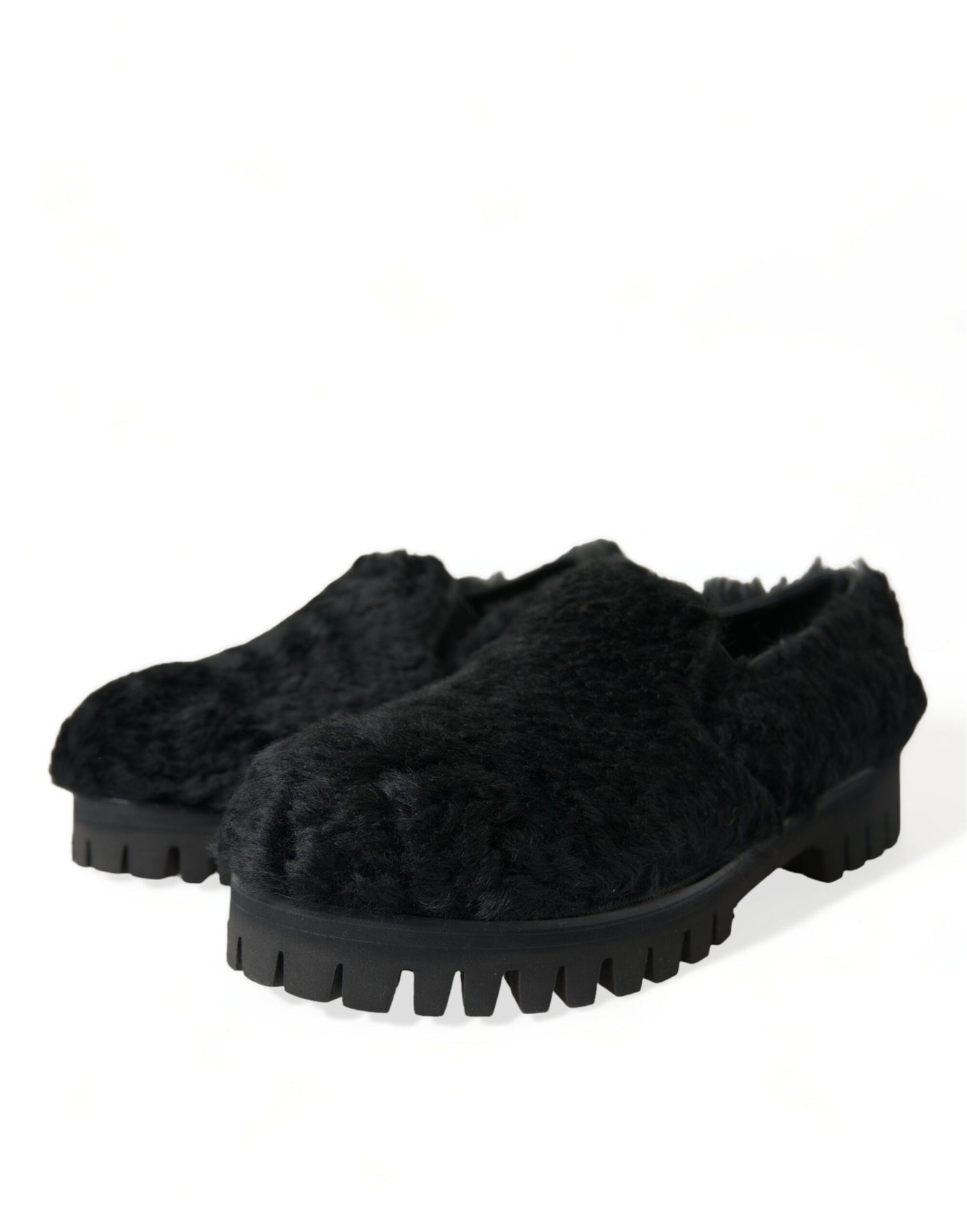 Elegantes mocasines negros de piel para hombre