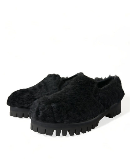 Elegantes mocasines negros de piel para hombre