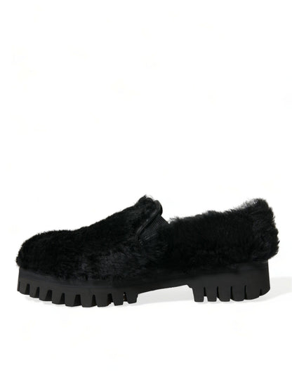 Elegantes mocasines negros de piel para hombre