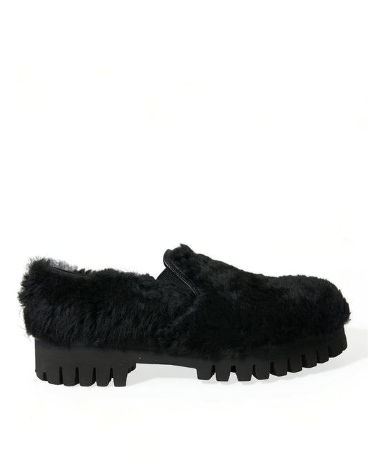 Elegantes mocasines negros de piel para hombre