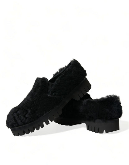 Elegantes mocasines negros de piel para hombre
