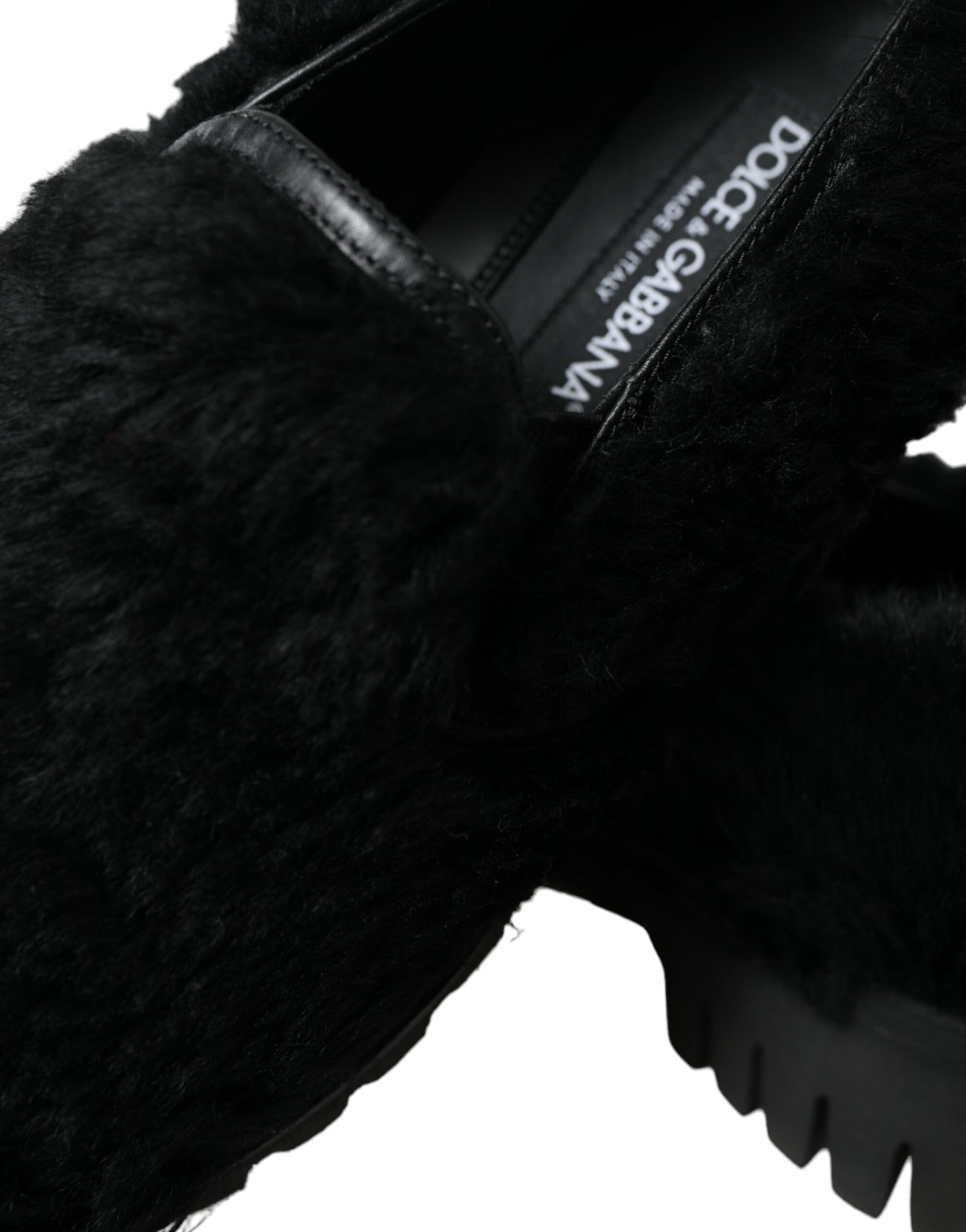 Elegantes mocasines negros de piel para hombre
