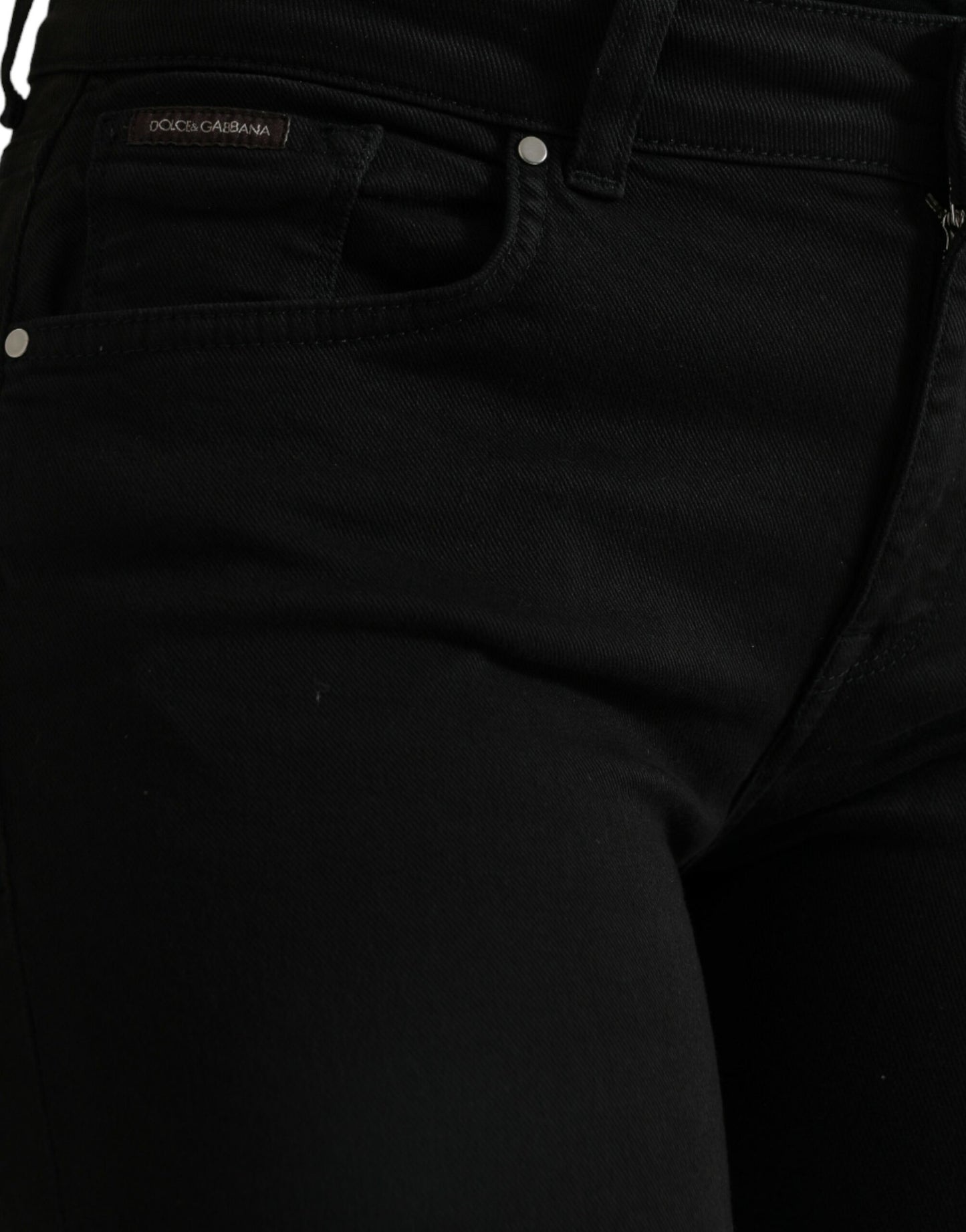 Elegantes jeans negros elásticos de cintura media