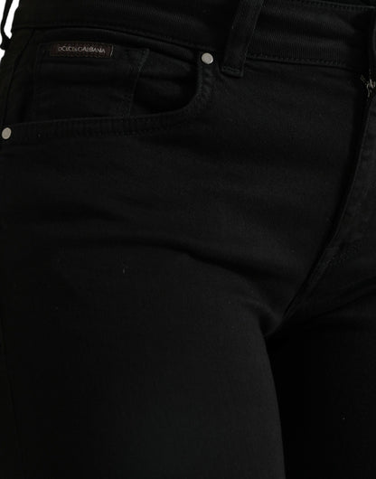 Elegantes jeans negros elásticos de cintura media