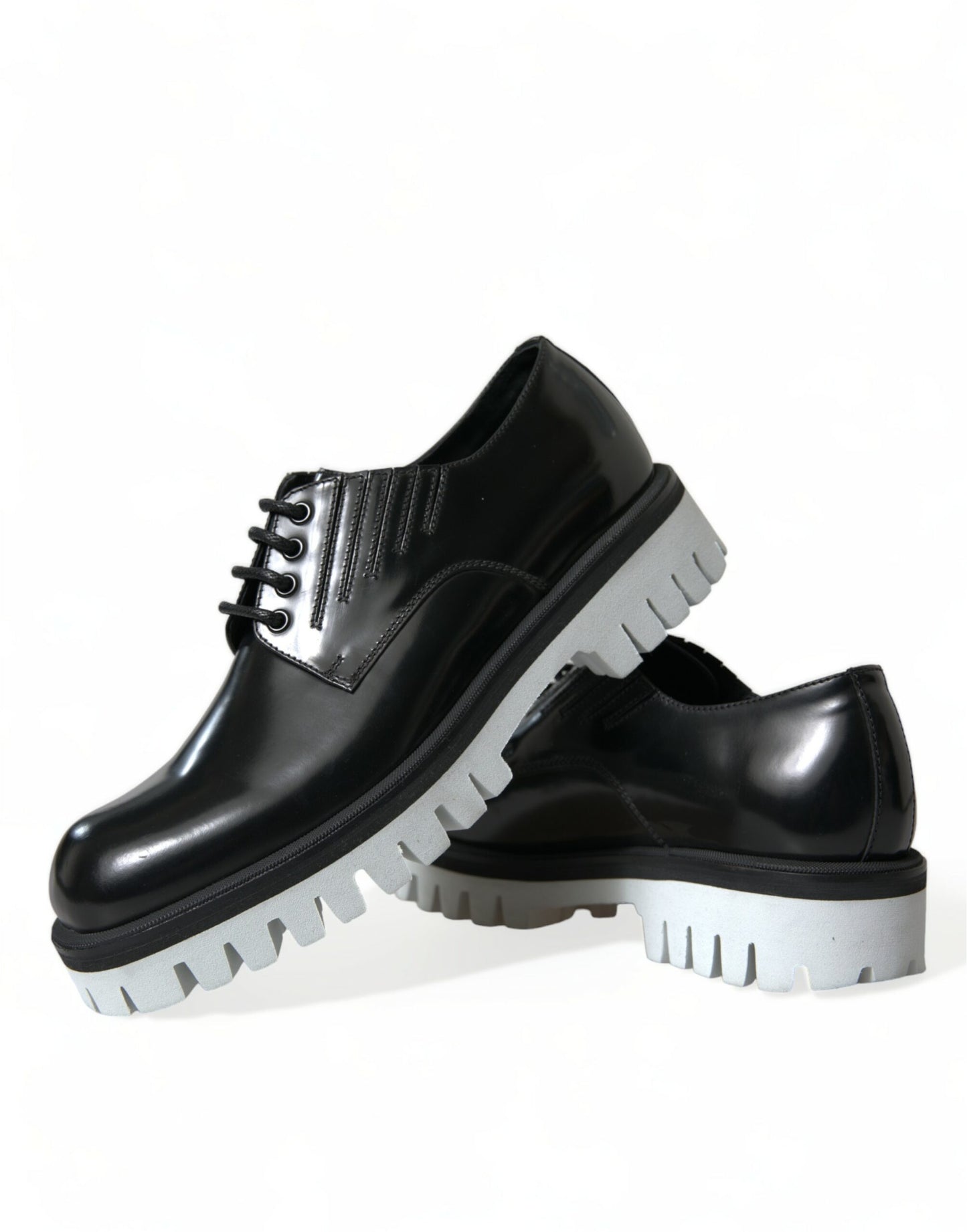 Sofisticados zapatos Derby de cuero blanco y negro
