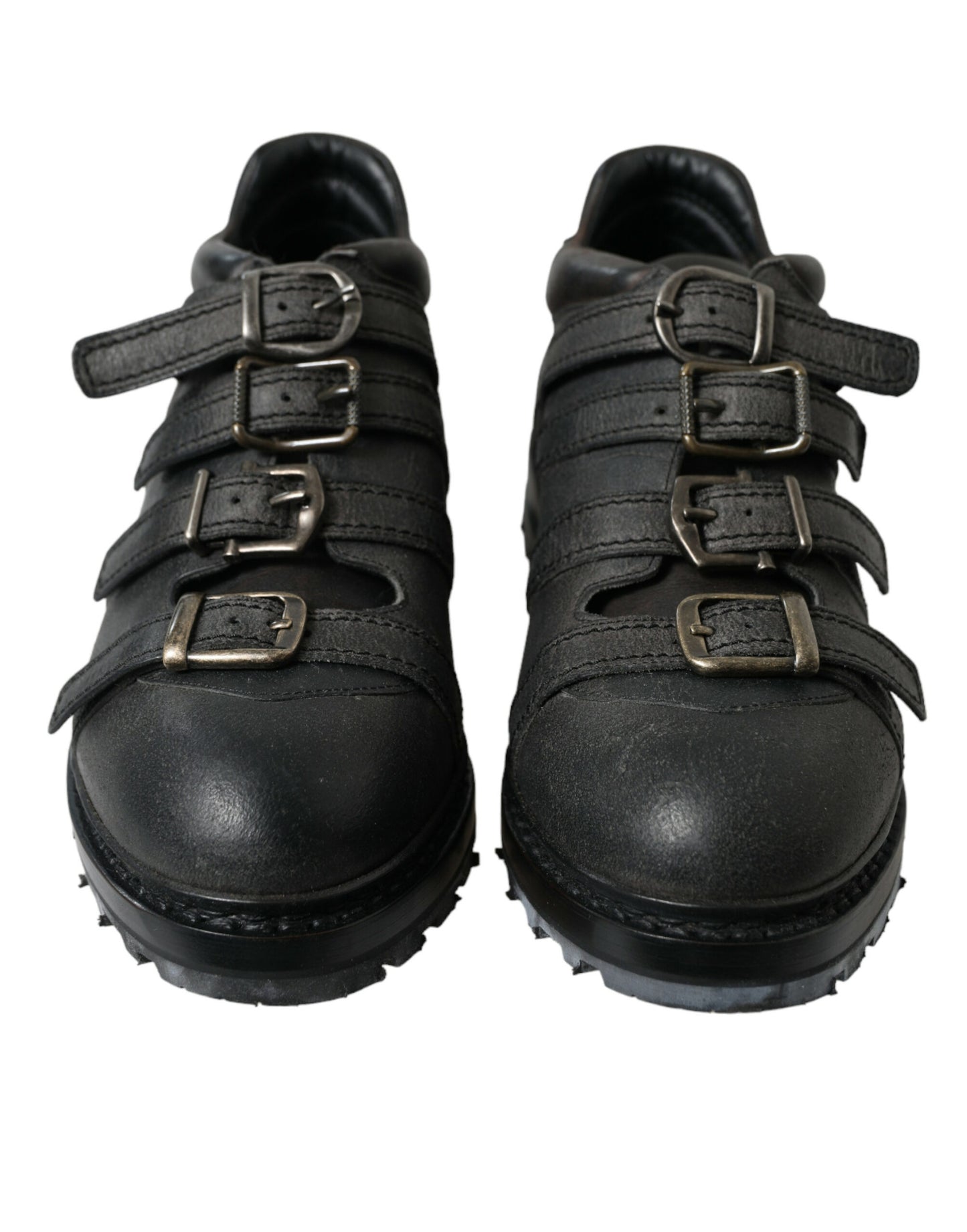 Botas negras de cuero con tiras al tobillo